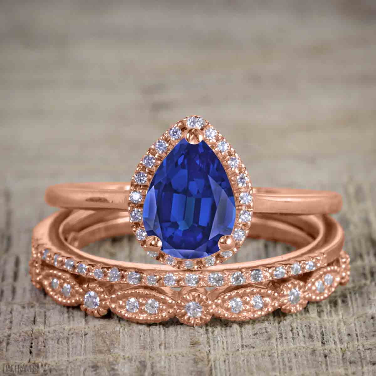 Pear Cut Lab Created Blue Sapphire Trio Wedding Ring Set V80377